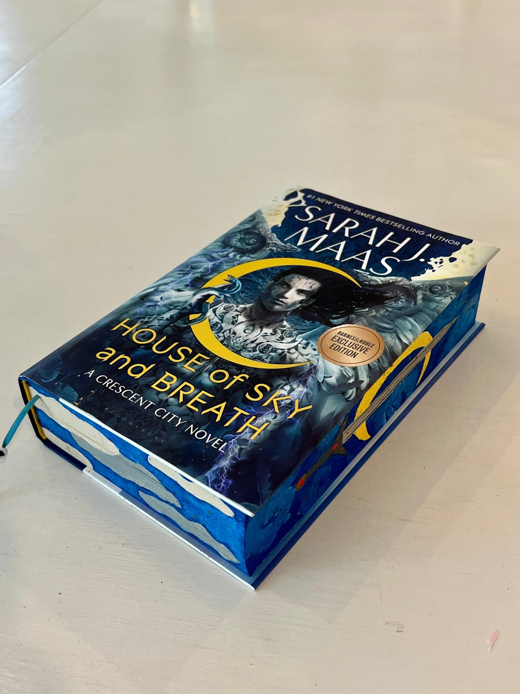 View blue and gold painted fantasy book edges